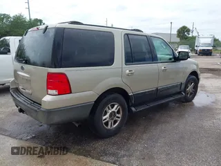 2004 Ford Expedition Special Service with VIN 1FMPU16L24LA37285, listed as a IAAI auction lot 41865431 with 244,616 mi miles. Bid and sale history available at carsss.com. Image 4.