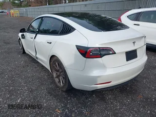 2021 Tesla Model 3 Long Range with VIN 5YJ3E1EB8MF974007, listed as a IAAI auction lot 41915513 with 107,354 mi miles and . Bid and sale history available at carsss.com. Image 3.
