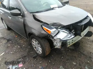 2015 Nissan Versa SV with VIN 3N1CN7AP7FL869485, listed as a IAAI auction lot 42077524 with 198,646 mi miles. Bid and sale history available at carsss.com. Image 6.