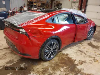 2024 Toyota Prius LE z VIN JTDADABU8R3013976, wystawiony jako IAAI lot #41621800 z przebiegiem 7475 mil mil oraz . Historia ofert i sprzedaży dostępna na DreamBid. Obrazek 4.