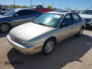 1998 Saturn SL z VIN 1G8ZK5271WZ129808, wystawiony jako IAAI lot #41993909 z przebiegiem 172 551 mil mil oraz . Historia ofert i sprzedaży dostępna na DreamBid. Obrazek 2.