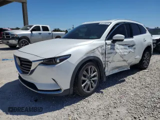 2016 Mazda CX-9 Grand Touring with VIN JM3TCADY9G0123193, listed as a Copart auction lot 50123825 with 65,588 mi miles and Salvage Title. Bid and sale history available at DreamBid. Image 1.