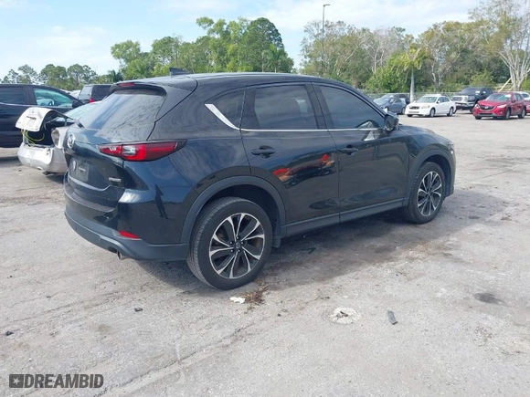 2022 Mazda CX-5 2.5 S Premium Package with VIN JM3KFBDM1N0577232, listed as a IAAI auction lot 41289385 with NaN miles. Bid and sale history available at carsss.com. Image 4.
