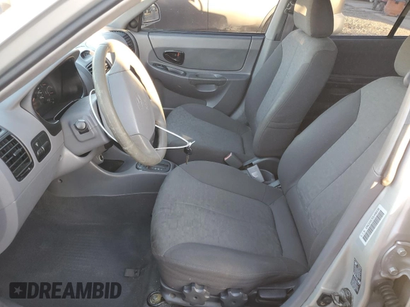 2003 Hyundai Accent GL with VIN KMHCG45C93U496038, listed as a Copart auction lot 87260904 with 104,251 mi miles and Salvage Title. Bid and sale history available at carsss.com. Image 7.