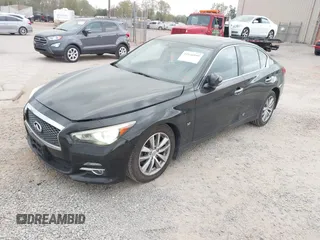 2015 Infiniti Q50 Premium z VIN JN1BV7ARXFM410177, wystawiony jako IAAI lot #41936999 z przebiegiem 129 123 mil mil oraz . Historia ofert i sprzedaży dostępna na DreamBid. Obrazek 2.