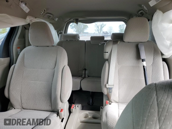 2015 Toyota Sienna LE AAS с VIN 5TDKK3DC8FS554952, выставлен на аукционе Copart как лот 54992385 с пробегом 98 399 миль миль и Списание • Salvage title. История ставок и продаж доступна на DreamBid. Изображение 10.