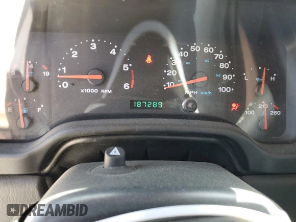 2004 Jeep Wrangler Sport with VIN 1J4FA49S44P788467, listed as a Copart auction lot 55395625 with 187,289 mi miles and Salvage title. Bid and sale history available at DreamBid. Image 9.