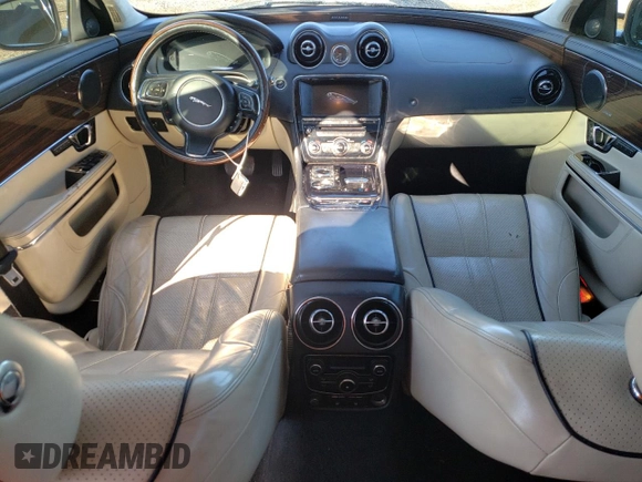 2015 Jaguar XJ Portfolio with VIN SAJWJ2GD1F8V77420, listed as a Copart auction lot 81786334 with 129,190 mi miles and Salvage title. Bid and sale history available at DreamBid. Image 8.