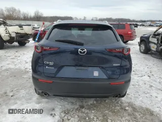2023 Mazda CX-30 2.5 S Premium Package with VIN 3MVDMBDM4PM519914, listed as a Copart auction lot 83295754 with Not Provided miles and Salvage Title. Bid and sale history available at carsss.com. Image 6.