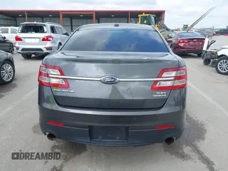 2015 Ford Taurus SEL with VIN 1FAHP2E83FG175051, listed as a IAAI auction lot 42357517 with 200,033 mi miles and . Bid and sale history available at DreamBid. Image 16.