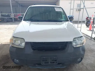 2005 Ford Escape XLT with VIN 1FMYU93155KA43398, listed as a IAAI auction lot 41930802 with 115,755 mi miles. Bid and sale history available at carsss.com. Image 12.