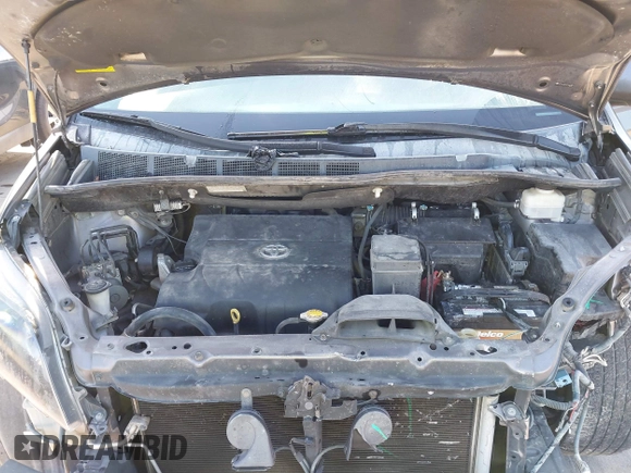 2014 Toyota Sienna SE with VIN 5TDXK3DC7ES482954, listed as a IAAI auction lot 41197465 with 160,107 mi miles and . Bid and sale history available at DreamBid. Image 10.