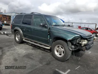 2000 Ford Explorer XLT z VIN 1FMZU73E9YZB18904, wystawiony jako Copart lot #47890925 z przebiegiem 248 363 mil mil oraz Szkoda całkowita • Salvage title. Historia ofert i sprzedaży dostępna na DreamBid. Obrazek 4.
