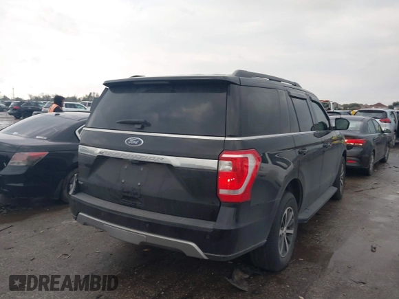 2020 Ford Expedition XLT with VIN 1FMJU1HT4LEA66163, listed as a IAAI auction lot 41200409 with 47,192 mi miles. Bid and sale history available at carsss.com. Image 4.