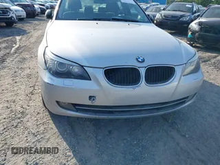 2009 BMW 5 Series 528i with VIN WBANU53569C122711, listed as a IAAI auction lot 42082909 with 157,581 mi miles and . Bid and sale history available at carsss.com. Image 6.