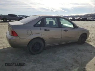 2005 Ford Focus S with VIN 1FAFP34N35W141023, listed as a Copart auction lot 84230574 with 244,545 mi miles and Salvage Title. Bid and sale history available at carsss.com. Image 3.