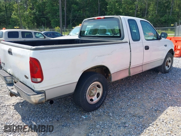 2003 Ford F-150 XL with VIN 1FTRX17203NB20937, listed as a IAAI auction lot 42396166 with 239,737 mi miles and . Bid and sale history available at DreamBid. Image 4.