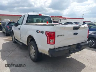 2015 Ford F-150 XL with VIN 1FTMF1E84FKD12758, listed as a IAAI auction lot 41841584 with 59,950 mi miles and . Bid and sale history available at DreamBid. Image 3.