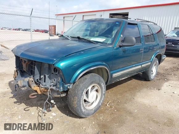 1998 Chevrolet Blazer LS z VIN 1GNDT13W7W2219654, wystawiony jako IAAI lot #42275733 z przebiegiem 150 384 mil mil oraz . Historia ofert i sprzedaży dostępna na DreamBid. Obrazek 18.