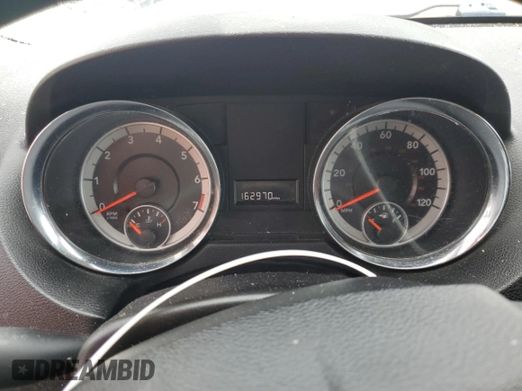 2013 Dodge Grand Caravan SXT with VIN 2C4RDGCGXDR581399, listed as a Copart auction lot 54787935 with 162,970 mi miles and Salvage Title. Bid and sale history available at DreamBid. Image 9.