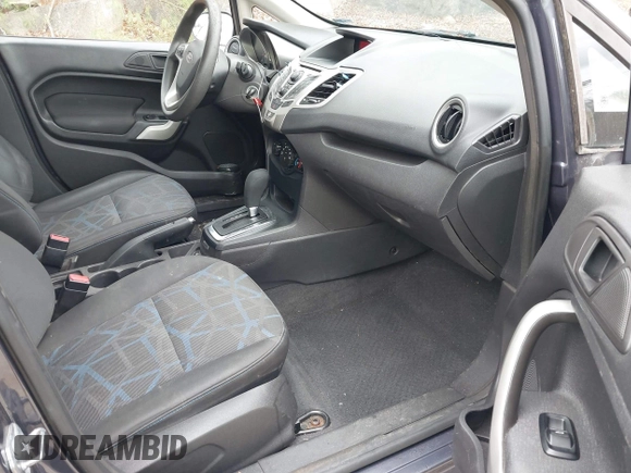 2012 Ford Fiesta SE with VIN 3FADP4BJ3CM152310, listed as a IAAI auction lot 42028398 with 124,530 mi miles and . Bid and sale history available at DreamBid. Image 5.