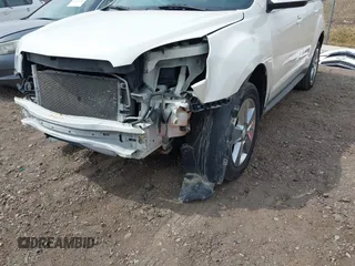 2013 Chevrolet Equinox LT z VIN 1GNALDEK9DZ112091, wystawiony jako IAAI lot #42120018 z przebiegiem 169 521 mil mil oraz . Historia ofert i sprzedaży dostępna na DreamBid. Obrazek 6.