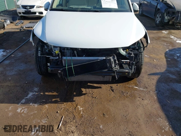 2016 Volkswagen Tiguan SE with VIN WVGBV7AX0GW018760, listed as a IAAI auction lot 41733586 with 60,743 mi miles and . Bid and sale history available at DreamBid. Image 6.