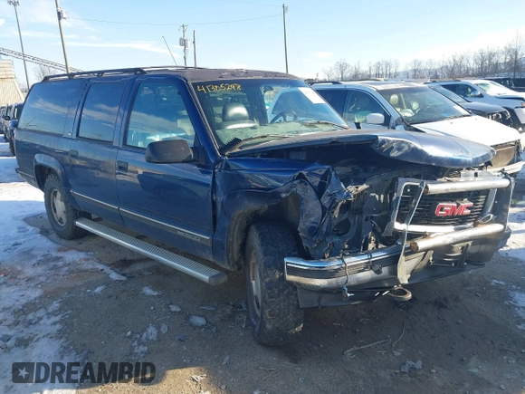 1998 GMC Suburban z VIN 1GKFK16R7WJ700525, wystawiony jako IAAI lot #41305248 z przebiegiem 205 300 mil mil oraz . Historia ofert i sprzedaży dostępna na DreamBid. Obrazek 1.