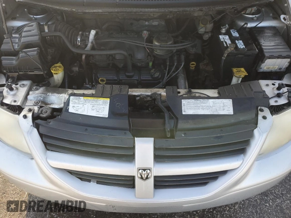 2005 Dodge Caravan SXT with VIN 1D4GP45R95B419486, listed as a Copart auction lot 60313045 with 180,615 mi miles and Salvage title. Bid and sale history available at DreamBid. Image 12.