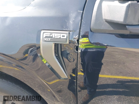 2023 Ford F-150 XL with VIN 1FTEW1C56PFC28013, listed as a IAAI auction lot 42242994 with Not Provided miles and . Bid and sale history available at DreamBid. Image 21.