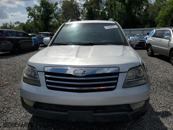 2009 Kia Borrego LX with VIN KNDJJ741395030543, listed as a Copart auction lot 51056035 with 165,448 mi miles and Salvage Title. Bid and sale history available at carsss.com. Image 5.