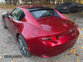 2021 Mazda MX-5 Miata Grand Touring z VIN JM1NDAM74M0461263, wystawiony jako Copart lot #81410634 z przebiegiem 44 551 mil mil oraz Szkoda całkowita • Salvage title. Historia ofert i sprzedaży dostępna na DreamBid. Obrazek 3.