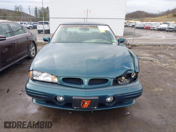 1996 Pontiac Bonneville z VIN 1G2HZ5210TH210829, wystawiony jako IAAI lot #41203888 z przebiegiem 154 990 mil mil oraz . Historia ofert i sprzedaży dostępna na DreamBid. Obrazek 12.