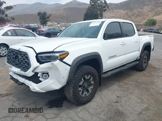 2023 Toyota Tacoma SR with VIN 3TMCZ5AN1PM556299, listed as a IAAI auction lot 42344160 with 42,338 mi miles and . Bid and sale history available at DreamBid. Image 21.