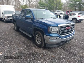 2019 GMC Sierra 1500 SLE z VIN 2GTV2MEC5K1219716, wystawiony jako IAAI lot #41954008 z przebiegiem 108 881 mil mil oraz . Historia ofert i sprzedaży dostępna na DreamBid. Obrazek 1.