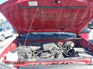 2014 Toyota Tacoma with VIN 5TFUX4EN7EX027719, listed as a IAAI auction lot 41922936 with 163,047 mi miles and . Bid and sale history available at DreamBid. Image 10.