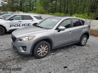 2013 Mazda CX-5 Touring with VIN JM3KE2CE1D0115023, listed as a Copart auction lot 52017905 with 174,254 mi miles and Clean Title. Bid and sale history available at carsss.com. Image 1.