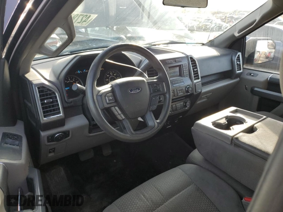 2015 Ford F-150 XL with VIN 1FTMF1C87FFB71471, listed as a Copart auction lot 42787685 with 124,782 mi miles and Salvage title. Bid and sale history available at DreamBid. Image 8.