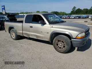 2002 Dodge Dakota with VIN 1B7GL12X02S545788, listed as a Copart auction lot 69987164 with 247,912 mi miles and Salvage Title. Bid and sale history available at carsss.com. Image 4.