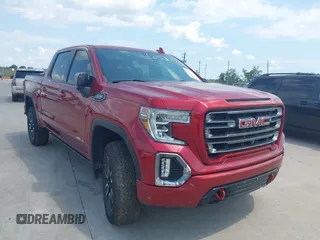 2021 GMC Sierra 1500 AT4 with VIN 1GTP9EEL0MZ284638, listed as a IAAI auction lot 40179412 with 117,272 mi miles. Bid and sale history available at carsss.com. Image 1.