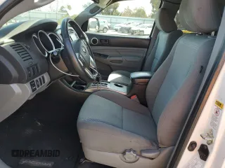 2014 Toyota Tacoma PreRunner with VIN 5TFTU4GN2EX063951, listed as a Copart auction lot 52083875 with 205,969 mi miles and Salvage title. Bid and sale history available at DreamBid. Image 7.