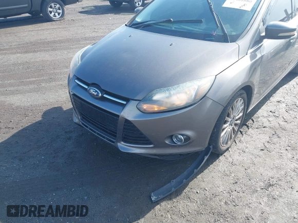 2012 Ford Focus Titanium with VIN 1FAHP3N28CL270225, listed as a IAAI auction lot 41401080 with 80,650 mi miles and . Bid and sale history available at carsss.com. Image 6.