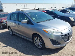 2012 Mazda Mazda5 Grand Touring with VIN JM1CW2DL2C0129518, listed as a IAAI auction lot 41872136 with 129,323 mi miles. Bid and sale history available at carsss.com. Image 1.