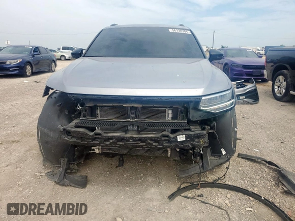 2023 Volkswagen Tiguan SE R-Line Black with VIN 3VVCB7AX5PM128335, listed as a Copart auction lot 56128305 with 21,524 mi miles and Salvage title. Bid and sale history available at DreamBid. Image 5.