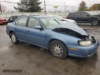 1999 Chevrolet Malibu LS with VIN 1G1NE52M9XY139570, listed as a Copart auction lot 80930334 with 121,273 mi miles and Salvage Title. Bid and sale history available at carsss.com. Image 4.