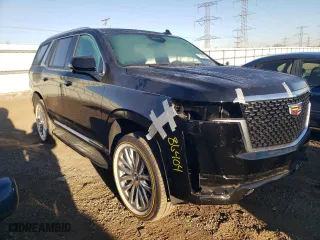 2024 Cadillac Escalade Premium Luxury with VIN 1GYS4BKL9RR232325, listed as a Copart auction lot 77145544 with 4,677 mi miles and Salvage Title. Bid and sale history available at carsss.com. Image 4.