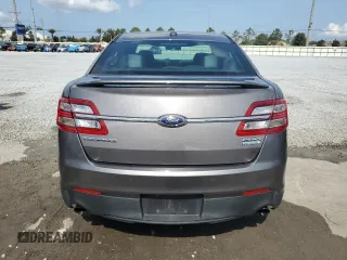 2014 Ford Taurus SHO with VIN 1FAHP2KT2EG152366, listed as a Copart auction lot 56479525 with 82,639 mi miles and Salvage title. Bid and sale history available at DreamBid. Image 6.