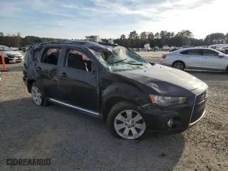 2010 Mitsubishi Outlander SE with VIN JA4AS3AW1AZ014063, listed as a Copart auction lot 79934964 with 140,404 mi miles and Salvage Title. Bid and sale history available at carsss.com. Image 4.