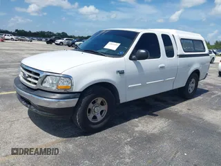 2003 Ford F-150 XL with VIN 1FTRX17W53NA40472, listed as a IAAI auction lot 42491035 with Not provided miles and . Bid and sale history available at DreamBid. Image 2.