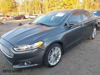 2016 Ford Fusion SE with VIN 3FA6P0HD6GR301773, listed as a IAAI auction lot 41007232 with 98,269 mi miles. Bid and sale history available at carsss.com. Image 2.